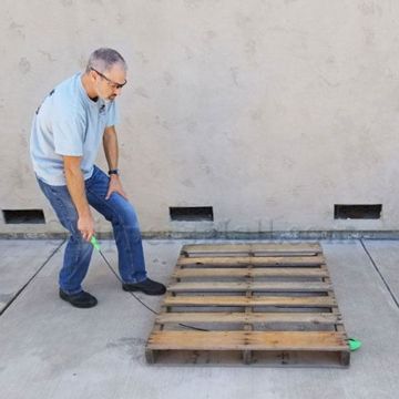 Strap Bandit is the new revelation in making threading steel band or strap through the rungs of a pallet in the most easy way. standing 2 Strap Bandit - Pallet Strapping Threading Tool Standing up 2