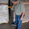 Strap Bandit - Pallet Strapping Threading Tool Standing up between pallets