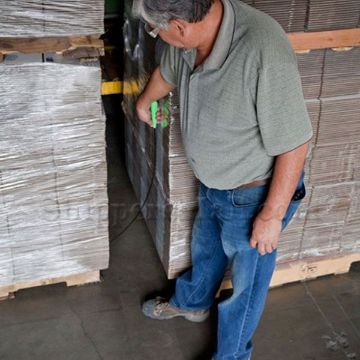 Strap Bandit is the new revelation in making threading steel band or strap through the rungs of a pallet in the most easy way. between pallets Strap Bandit - Pallet Strapping Threading Tool Standing up between pallets