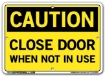 "CAUTION - CLOSE DOOR WHEN NOT IN USE" Sign in 28 Substrate Variations to fit your needs. Choose your Thickness, Material and Size.