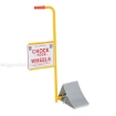 Aluminum Tire chock with long handle and sign "Chock your Wheels". 