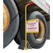 Aluminum wheel chock with long handle and sign "Chock your Wheels". EALUM-7-HS  in use