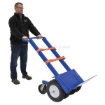 Heavy duty off road hand truck for moving heavy items over rough terrain has a 550 lb. Capacity.